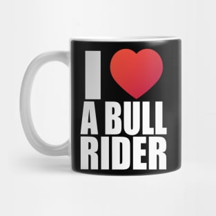 I love a bull rider; heart; bull; bull riding; rodeo; rodeo lover; sport; cowboy; horses; country; western; wild west; funny; cool; cute; girlfriend; wife; partner; husband; boyfriend; cowgirl; country gal; ranch; rodeo rider; Mug